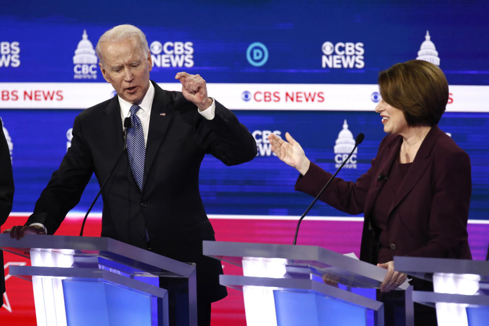 From left, Democratic presidential candidate former Vice President Joe Biden and Sen. Amy Klobuchar, D-Minn., participate in a Democratic presidential primary debate at the Gaillard Center, Tuesday, Feb. 25, 2020, in Charleston, S.C., co-hosted by CBS News and the Congressional Black Caucus Institute. (AP Photo/Patrick Semansky)