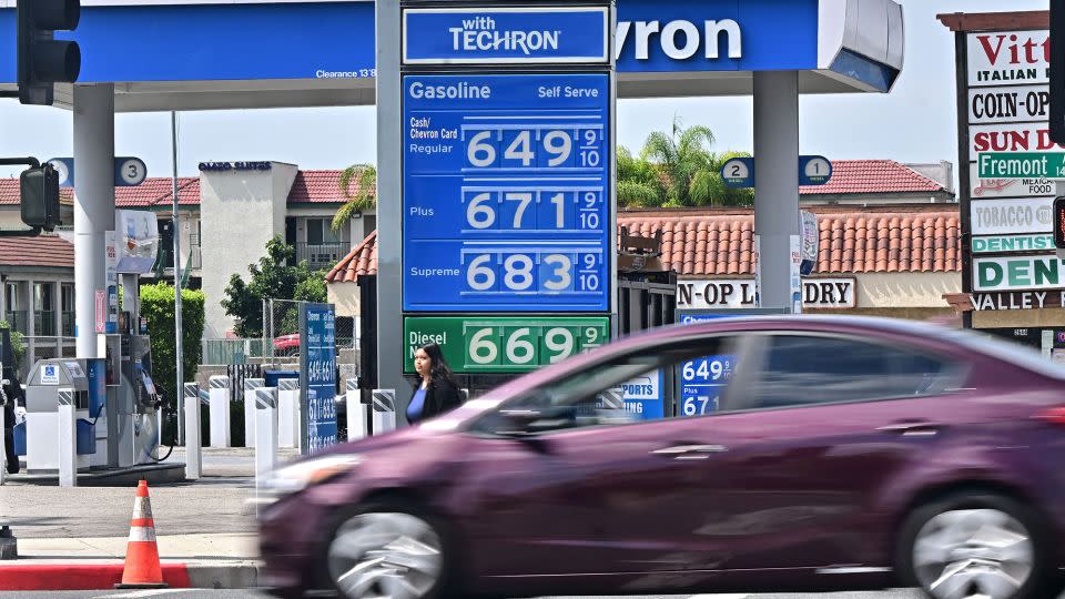 A sign displays the price of gas at more than 6 USD per gallon, at a petrol station in Alhambra, California, on September 18. - Frederic J. Brown/AFP/Getty Images
