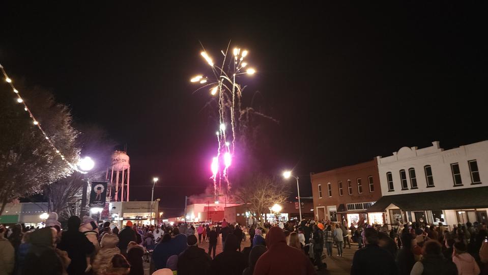 Fireworks lit up the skies Saturday Night as thousands gather in the Canyon City Square for the lighting of the tree in Canyon, Texas.