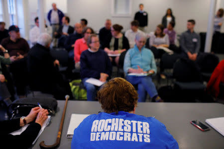 Local Democrats gather for a meeting in Rochester, New Hampshire, U.S., March 27, 2018. REUTERS/Brian Snyder