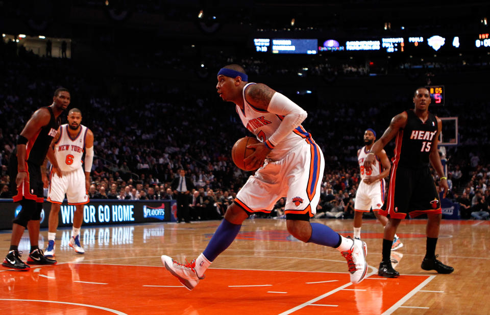 NEW YORK, NY - MAY 03: Carmelo Anthony #7 of the New York Knicks drives in the first quarter against the Miami Heat in Game Three of the Eastern Conference Quarterfinals in the 2012 NBA Playoffs on May 3, 2012 at Madison Square Garden in New York City. NOTE TO USER: User expressly acknowledges and agrees that, by downloading and or using this photograph, User is consenting to the terms and conditions of the Getty Images License Agreement. (Photo by Jeff Zelevansky/Getty Images)