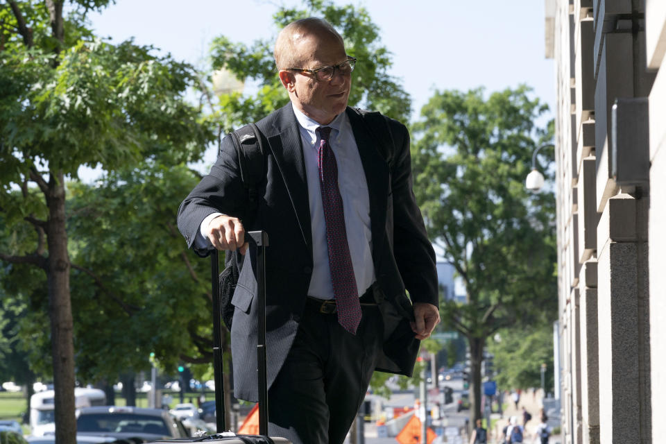 Steve Bannon's attorney, David Schoen, arrives at the Federal Courthouse for a hearing for Bannon on Monday, July 11, 2022, in Washington. Bannon, a former White House strategist and ally of President Donald Trump, was indicted late last year on two counts of criminal contempt of Congress after he defied a subpoena from the House committee investigating the Jan. 6 insurrection at the U.S. Capitol. District Judge Carl Nichols is deciding whether Bannon's trial should be delayed until October. Steve Bannon did not arrive at the courthouse. (AP Photo/Jose Luis Magana)
