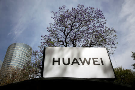 FILE PHOTO: The Huawei logo is seen at a bus stop in Mexico City, Mexico February 22, 2019. REUTERS/Daniel Becerril/File Photo