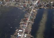 An aerial view of the devastation of super Typhoon Haiyan as it battered a town in Samar province in central Philippines November 11, 2013. REUTERS/Erik De Castro