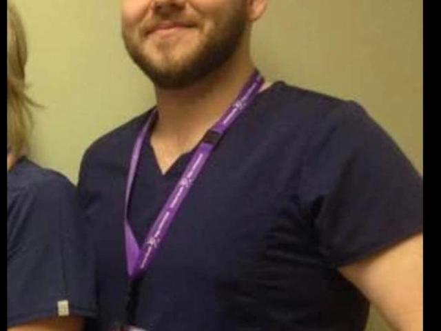 Brandon Tucker, seen here at work as a personal care attendant, was last seen Friday morning in Gander.  (Family of Brandon Tucker - image credit)