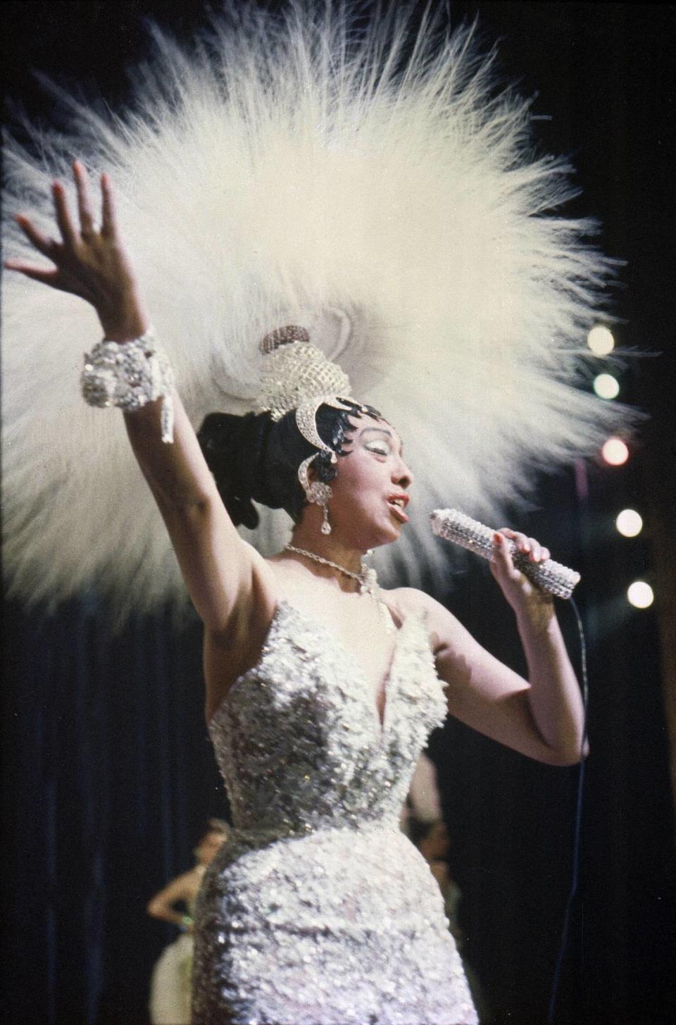 St. Louis native Josephine Baker found more than stardom and acceptance in France. She lived in a fairy-tale castle from 1947 until the late ’60s, raised 12 orphans and created a theme part dedicated to multiculturalism. Here, Baker, holding a rhinestone-studded microphone, performed her show “Paris, mes Amours” at the Olympia Music Hall on May 27, 1957.