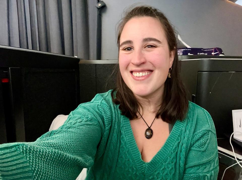 A selfie of the author in a green sweater in the Club Suite.