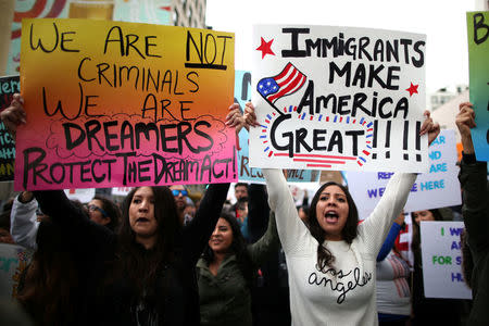 People participate in a protest march calling for human rights and dignity for immigrants, in Los Angeles, February 18, 2017. REUTERS/Lucy Nicholson