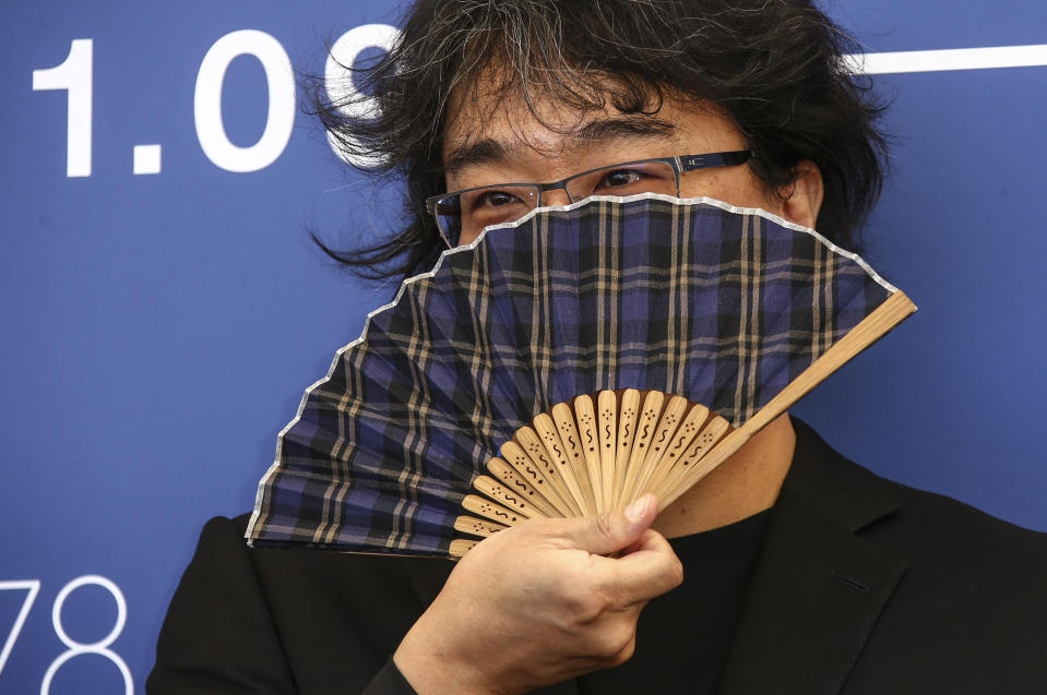 FILE - In this Sept, 1, 2021 file photo Jury president Bong Joon-ho poses for photographers at the photo call for the jury during the 78th edition of the Venice Film Festival in Venice, Italy (Photo by Joel C Ryan/Invision/AP, File)