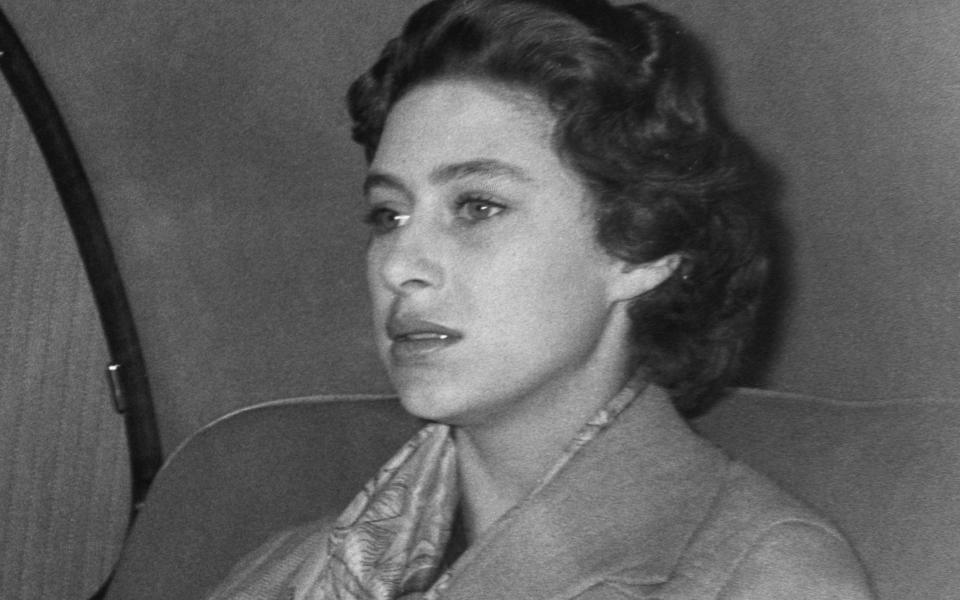 Princess Margaret returns to London after spending a weekend in the country. She announced shortly afterwards that she would not be marrying the divorcee Captain Peter Townsend - Getty