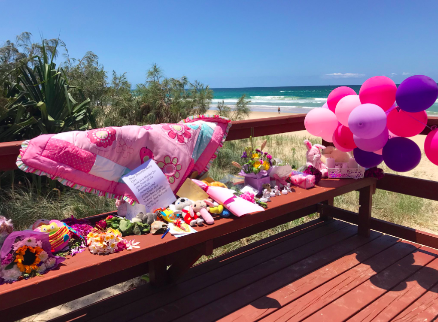 Balloons, soft toys and flowers were also left at the Surfers Paradise beach. Source: 7News/ Sarah Greenhalgh