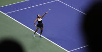 Naomi Osaka, of Japan, serves against Belinda Bencic, of Switzerland, during the fourth round of the US Open tennis championships Monday, Sept. 2, 2019, in New York. (AP Photo/Frank Franklin II)