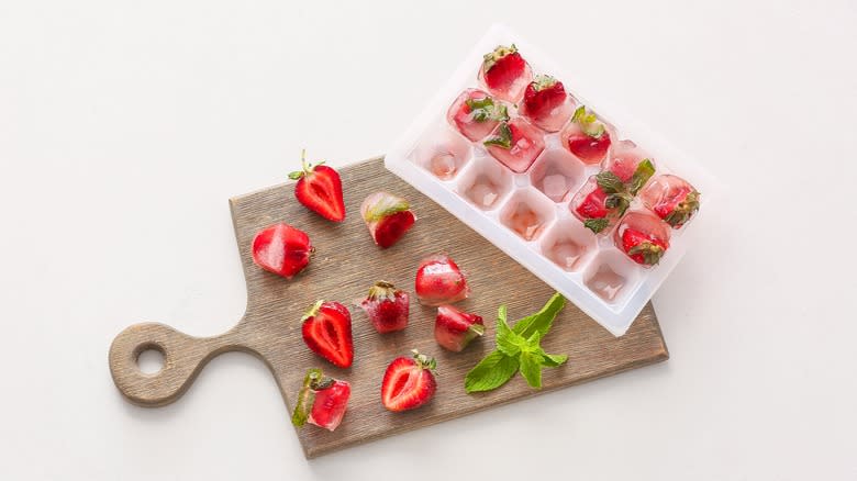Strawberry ice cubes in tray