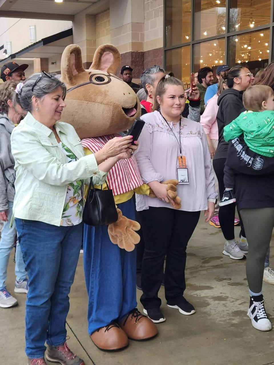 Employees from the new Columbia Barnes & Noble stand with the famed children’s book character Arthur on March 6, 2024.