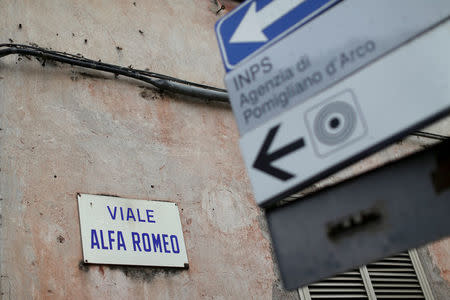 A street signs hang in Pomigliano D'Arco, near Naples, Italy, February 21, 2018. Picture taken February 21, 2018. REUTERS/Alessandro Bianchi