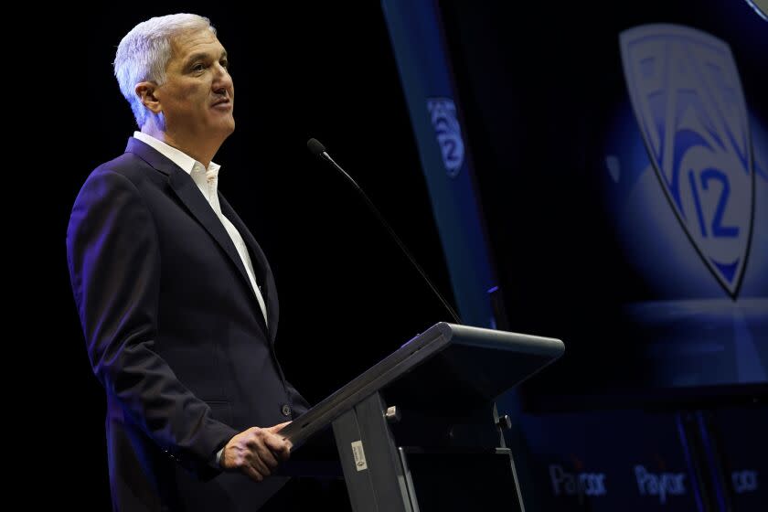 Pac-12 Conference commissioner George Kliavkoff speaks at Pac-12 NCAA college football media day Friday, July 29, 2022, in Los Angeles. (AP Photo/Damian Dovarganes)