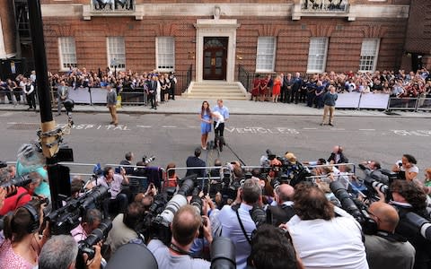 The Duke and Duchess of Cambridge leave the Lindo Wing of St Mary's Hospital in 2013 with Prince George - Credit: Dominic Lipinski/PA