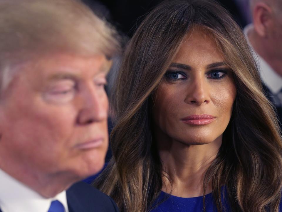 DETROIT, MI - MARCH 03: Republican presidential candidate Donald Trump and his wife Melania greet reporters in the spin room after a discussion sponsored by Fox News at the Fox Theater on March 3, 2016 in Detroit, Michigan.  Michigan voters will go to the polls on March 8 for the state's primary. 