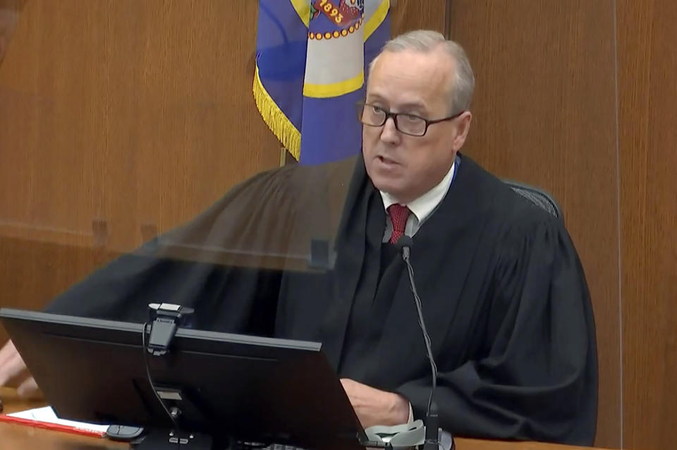 FILE - Hennepin County Judge Peter Cahill presides over the sentencing of former Minneapolis police Officer Derek Chauvin at the Hennepin County Courthouse in Minneapolis, June 25, 2021. “When you’re in a high-profile trial, you feel the stress, you feel the pressure even if you’re not reading the papers,” Cahill told an audience of judges last year at The National Judicial College in Reno, Nev. (Court TV via AP, Pool, File)