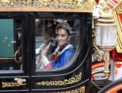 <p>Britain's Catherine, Princess of Wales and Britain's Prince William, Prince of Wales travel back to Buckingham Palace from Westminster Abbey in central London on May 6, 2023, after the coronations of Britain's King Charles III and Britain's Queen Camilla. - The set-piece coronation is the first in Britain in 70 years, and only the second in history to be televised. Charles will be the 40th reigning monarch to be crowned at the central London church since King William I in 1066. (Photo by Charles McQuillan / POOL / AFP) (Photo by CHARLES MCQUILLAN/POOL/AFP via Getty Images)</p> 