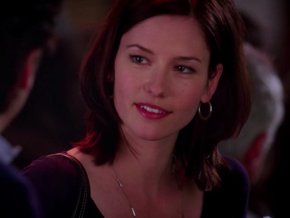 Chyler Leigh as Lexi on Greys Anatomy wearing a dark colored shirt and necklace