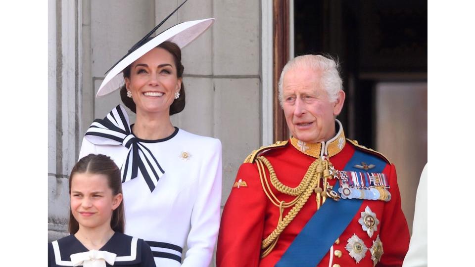 Kate standing next to Charles on palace balcony