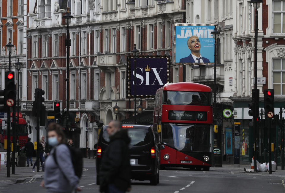 A general view of the exterior of the Apollo Theater, on Shaftesbury Avenue, which is making preparations to continue its run of the musical "Everybody's Talking About Jamie', in London, Monday, April 12, 2021. (AP Photo/Alastair Grant)