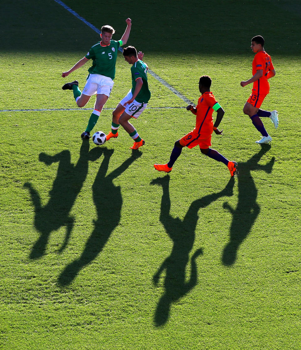 <p>Ireland’s Troy Parrott in action against Holland’s Daishawn Redan during the UEFA European Under-17 Championship quarter-final in Burton. Holland went on to win the tournament, with hosts England losing semi-finalists (Mike Egerton/PA). </p>