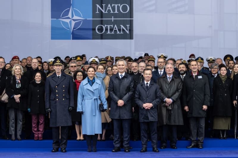 (L-R) Swedish Chief of Defence General Micael Byden, Swedish Crown Princess Victoria, NATO Secretary General Jens Stoltenberg, Swedish Prime Minister Ulf Kristersson and NATO Permanent Representative Axel Wernhoff pose with military and staff personnel after a ceremony to mark the accession of Sweden to NATO at NATO headquarters. -/NATO/dpa