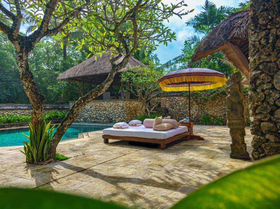 Time can disappear beside the pool at The Oberoi Beach Resort, Bali (Oberoi Hotels and Resorts)
