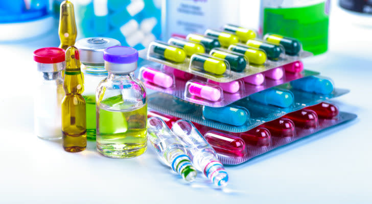 colorful pills and vials sitting on a table representing MDGS stock.