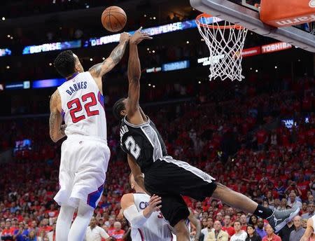 May 2, 2015; Los Angeles, CA, USA; Los Angeles Clippers forward Matt Barnes (22) blocks a shot by San Antonio Spurs forward Kawhi Leonard (2) at the buzzer in game seven of the first round of the NBA Playoffs at Staples Center. Clippers won 111-109. Mandatory Credit: Jayne Kamin-Oncea-USA TODAY Sports