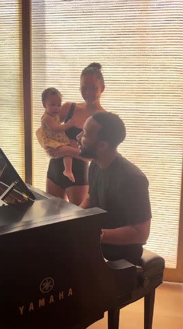 <p>Chrissy Teigen Instagram</p> John Legend singing to daughter Esti in an Instagram video shared on Nov. 22, 2023