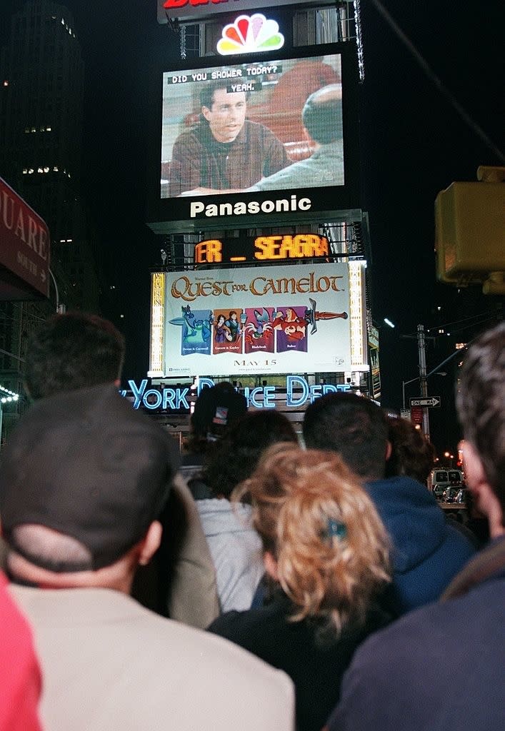 People watching "Seinfeld" in Times Square