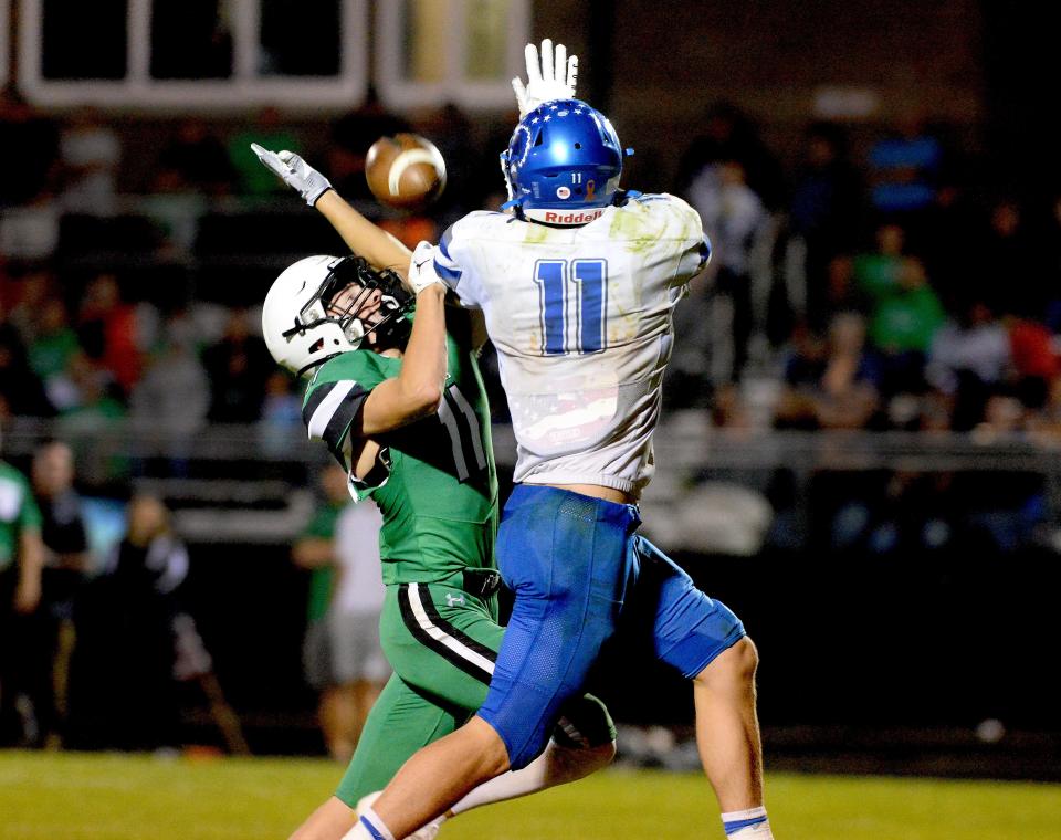 Auburn's Grant Dobson catches a pass for a touchdown while being guarded by Athen's Grant Purchis during the game Friday, Sept. 15, 2023.