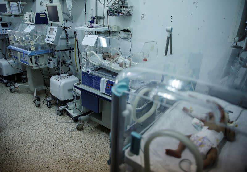 Premature babies are seen in incubators at a maternity hospital in Idlib