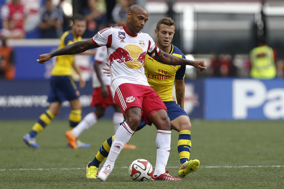 Henry playing for New York Red Bulls against former club Arsenal in a friendly in 2014. (Photo by Jeff Zelevansky/Getty Images)