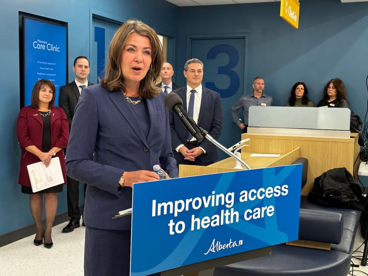 Alberta Premier Danielle Smith speaks at a Shoppers Drug Mart in northeast Edmonton on Thursday as the company announces it plans to convert 103 of its Alberta locations to 