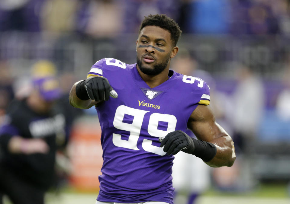 FILE - In this Dec. 29, 2019, file photo, Minnesota Vikings defensive end Danielle Hunter warms up before the team's NFL football game against the Chicago Bears in Minneapolis. Hunter made his first appearance on the practice field, Tuesday, June 15, 2021, after skipping the previous spring sessions. (AP Photo/Andy Clayton-King, File)