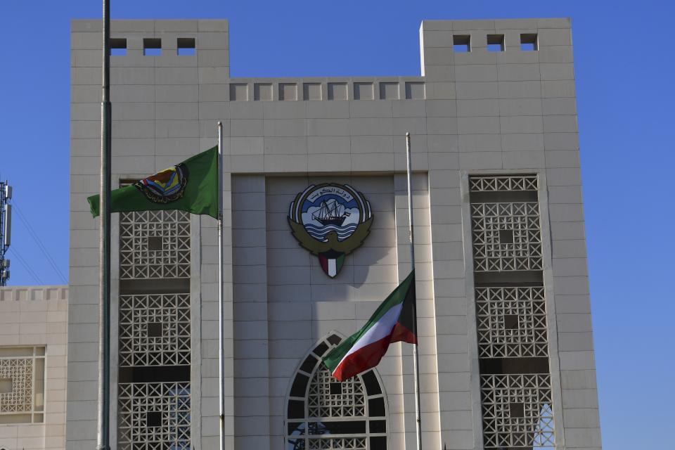 Kuwait national flag is in half mast after the death of the Emir of Kuwait Sheikh Nawaf Al Ahmad Al Sabah, in Kuwait, Saturday, Dec. 16, 2023. Kuwait's ruling emir, the 86-year-old Sheikh Nawaf Al Ahmad Al Sabah, died Saturday after a three-year, low-key reign focused on trying to resolve the tiny, oil-rich nation's internal political disputes. (AP Photo/Jaber Abdulkhaleg)