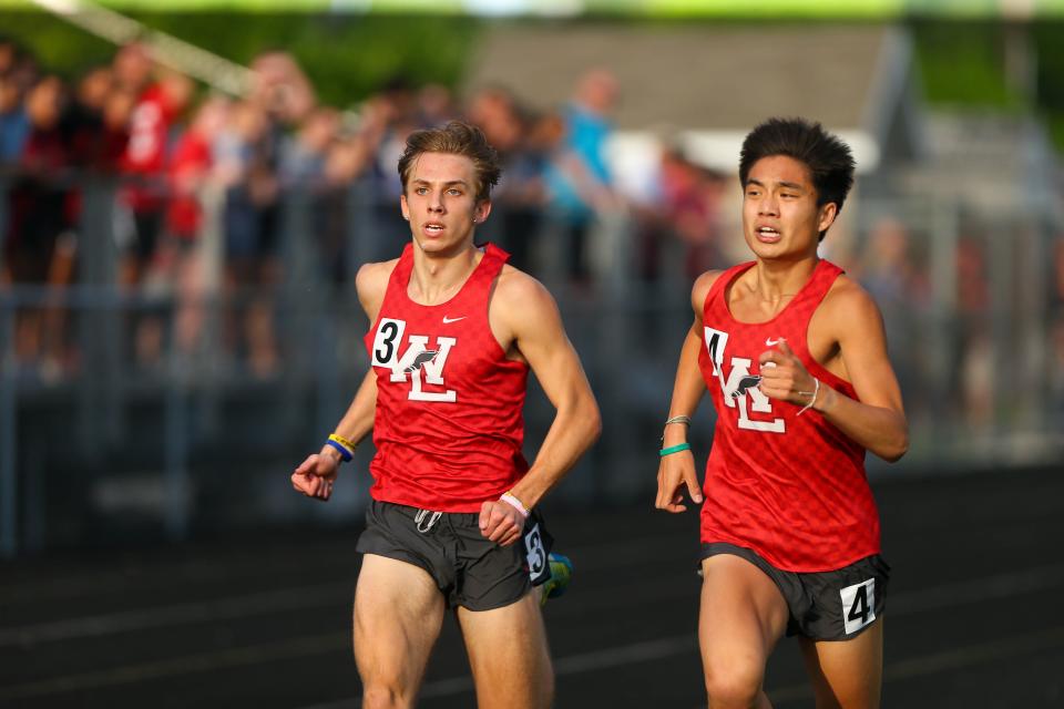Elijah Stenberg (11) and Henry Balagtas (12), West Lafayette High School, fight for the lead in the last 100 meters of the 1600 Meter Run at the 2022 IHSAA Boys Track and Field Sectional at West Lafayette Athletic Complex, on May 19, 2022, in West Lafayette.