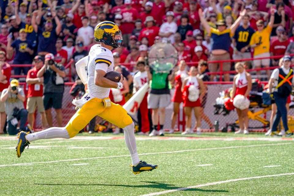 Michigan quarterback J.J. McCarthy runs for a touchdown against Nebraska during the second quarter of U-M's 45-7 win on Saturday, Sept. 30, 2023, in Lincoln, Nebraska.