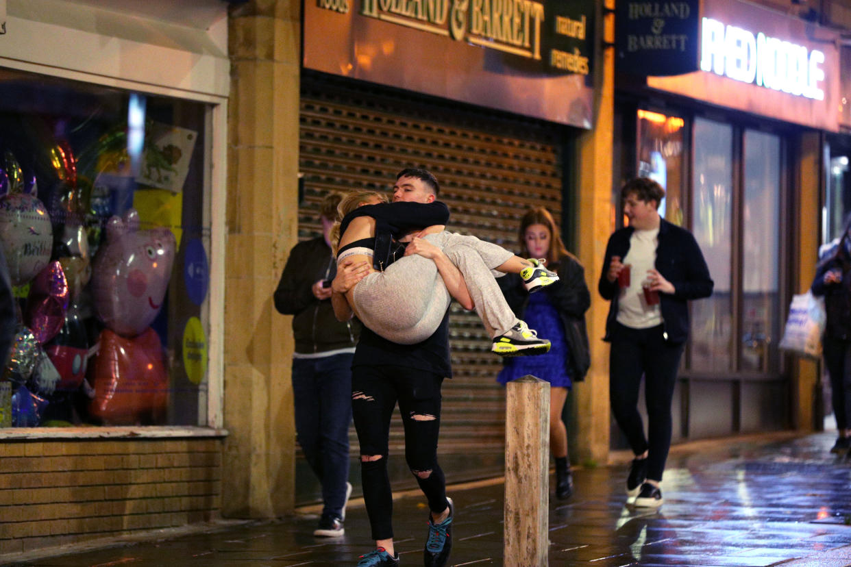 People out socialising in Liverpool city centre, ahead of the 10pm curfew that pubs and restaurants are subject to in order to combat the rise in coronavirus cases in England. Cities in northern England and other areas suffering a surge in Covid-19 cases may have pubs and restaurants temporarily closed to combat the spread of the virus.