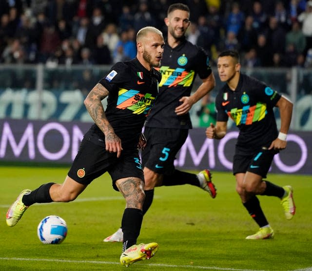 Federico Dimarco celebrates after scoring Inter Milan's first goal 