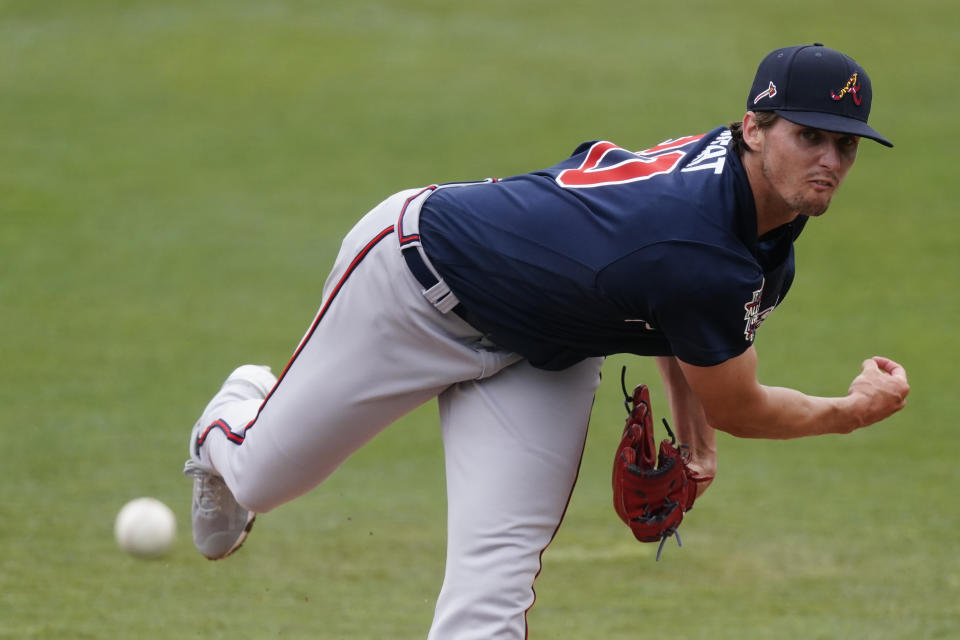 Atlanta Braves starting pitcher Kyle Wright (30) delivers in the second inning of a spring training baseball game Minnesota Twins, Monday, March 22, 2021, in Fort Myers, Fla. (AP Photo/John Bazemore)