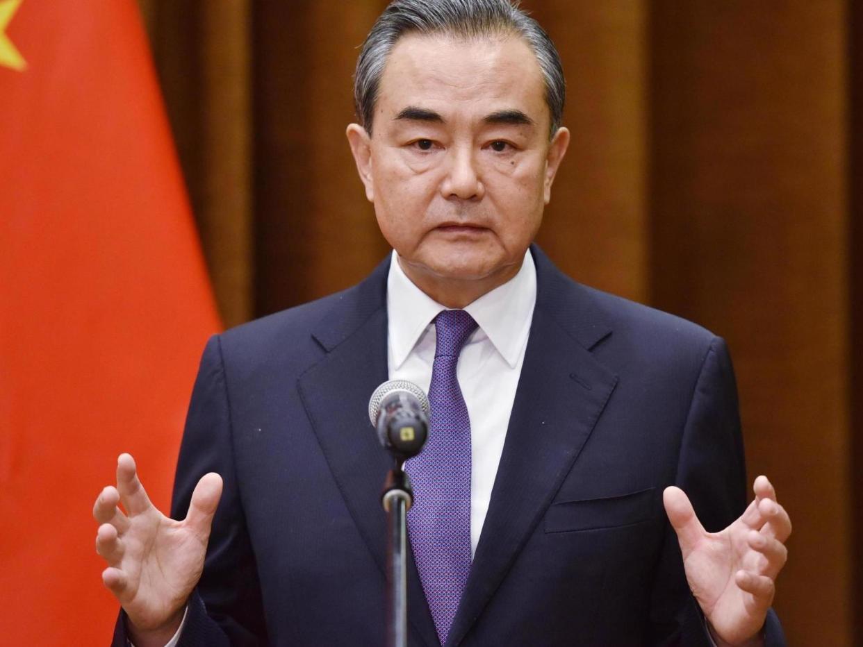 Foreign minister Wang Yi speaking at a joint briefing with the Association of South East Asian Nations in June 2018: Getty