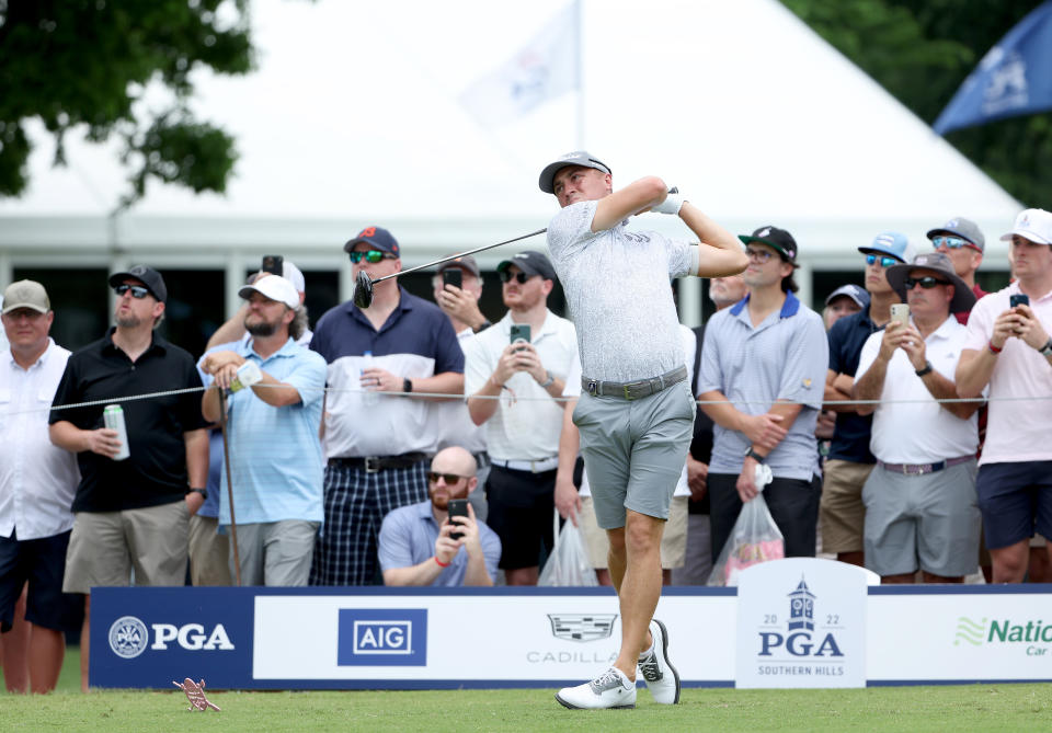 Justin Thomas (pictured) plays his shot from the second tee.