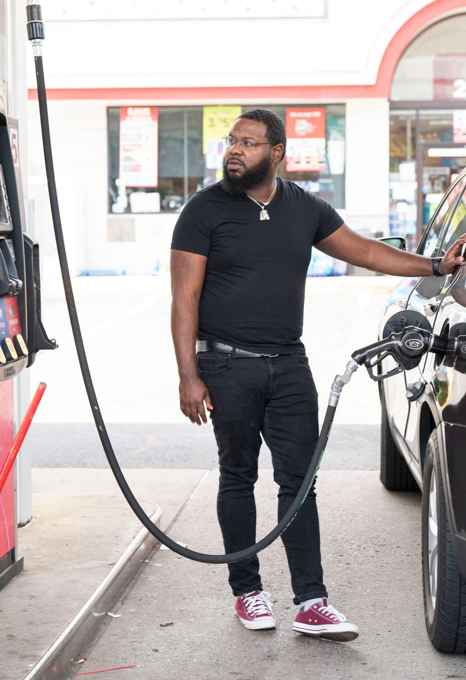 Lamar Kennedy, from Bristol, filling up at the Speedway gas station on Veterans Highway in Bristol on Monday, July 31, 2023.