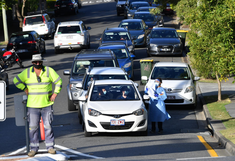 Testing centres are expected to be at their limits in Queensland's southeast on Wednesday. Source: AAP