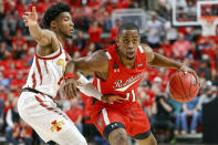 Texas Tech's Bryson Williams (11) works around Iowa State's Tyrese Hunter (11) during the first half of an NCAA college basketball game on Tuesday, Jan. 18, 2022, in Lubbock, Texas. (AP Photo/Chase Seabolt)